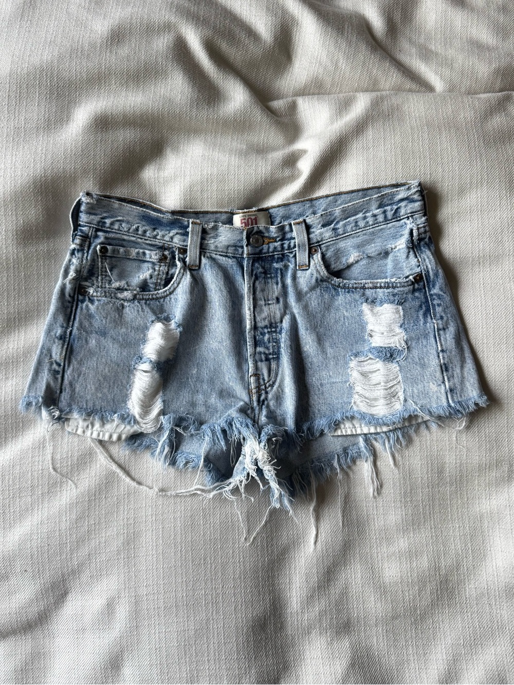 Levi’s 501 Distressed Cutoff Denim Shorts Light Wash